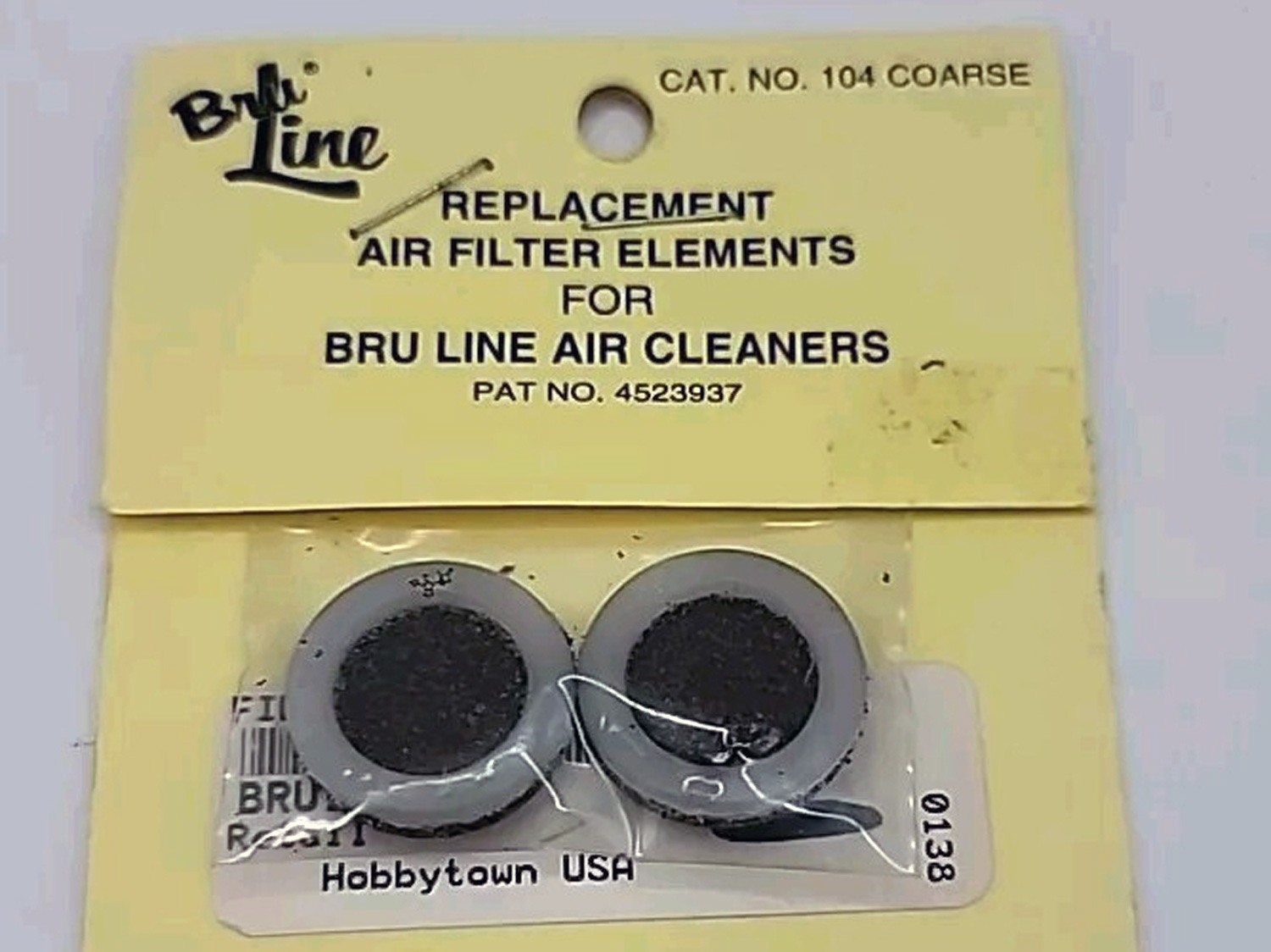 Close up of a pack of Bru Line No.104 air filters for model airplane engines.
