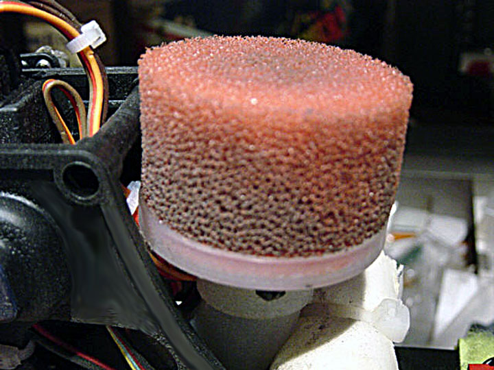 Close up image of a filthy air filter element